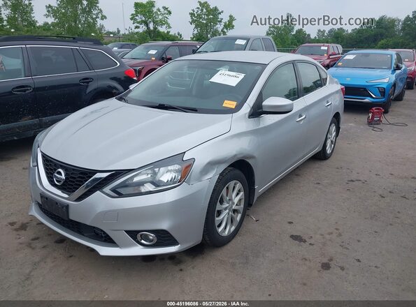 3N1AB7AP1JY228005 2018 NISSAN SENTRA Silver Front left