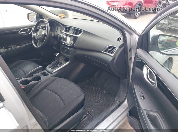 3N1AB7AP1JY228005 2018 NISSAN SENTRA Silver Front interior view
