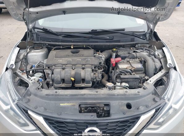 3N1AB7AP1JY228005 2018 NISSAN SENTRA Silver Rear view