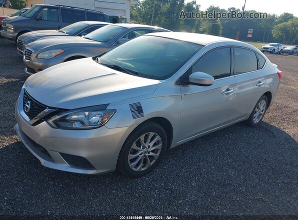 3N1AB7AP2JY251387 2018 NISSAN SENTRA Серебряный Передняя левая четверть