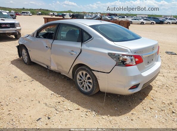 3N1AB7AP3JL605916 2018 NISSAN SENTRA Silver Trasero izquierdo