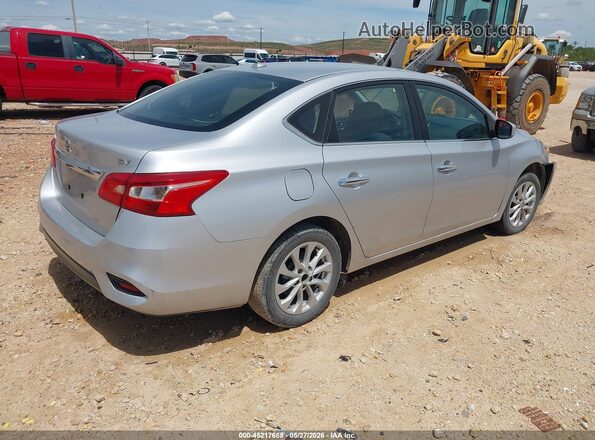 3N1AB7AP3JL605916 2018 NISSAN SENTRA Silver Trasero derecho
