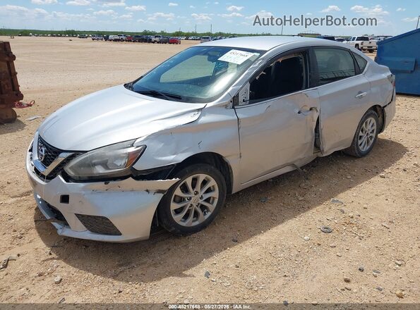 3N1AB7AP3JL605916 2018 NISSAN SENTRA Silver Vista tres cuartos delantera izquierda