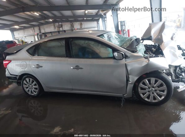 3N1AB7AP3JY291879 2018 NISSAN SENTRA Silver Rear interior view