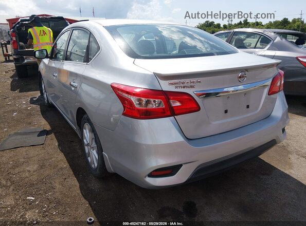 3N1AB7AP3KY239833 2019 NISSAN SENTRA Silver Trasero izquierdo
