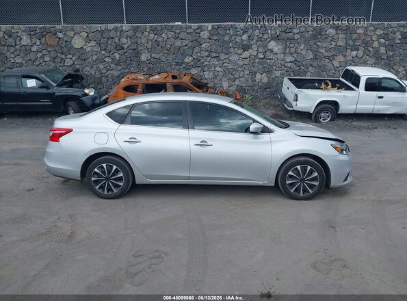 3N1AB7AP3KY249018 2019 NISSAN SENTRA Silver Вид задньої частини салону