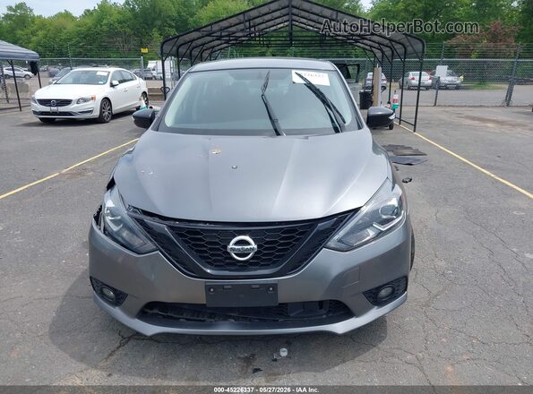 3N1AB7AP4JY275299 2018 NISSAN SENTRA Gray Вид задньої частини салону