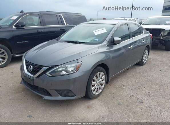 3N1AB7AP4KY410220 2019 NISSAN SENTRA Gray Vista tres cuartos delantera izquierda