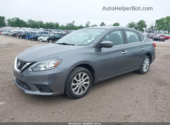 3N1AB7AP5JL650517 2018 NISSAN SENTRA Gray Vista tres cuartos delantera izquierda