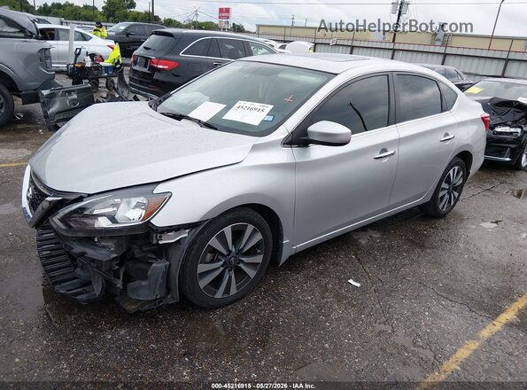 3N1AB7AP5KY323118 2019 NISSAN SENTRA Серебряный Передняя левая четверть
