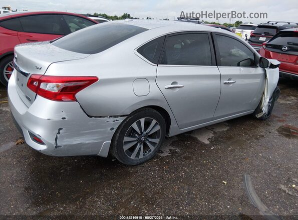 3N1AB7AP5KY323118 2019 NISSAN SENTRA Серебряный Задняя правая четверть