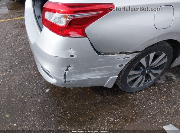 3N1AB7AP5KY323118 2019 NISSAN SENTRA Серебряный Вид спереди