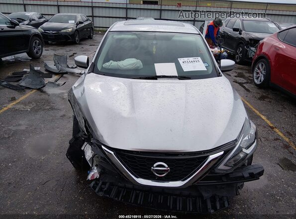 3N1AB7AP5KY323118 2019 NISSAN SENTRA Серебряный Вид задней части салона