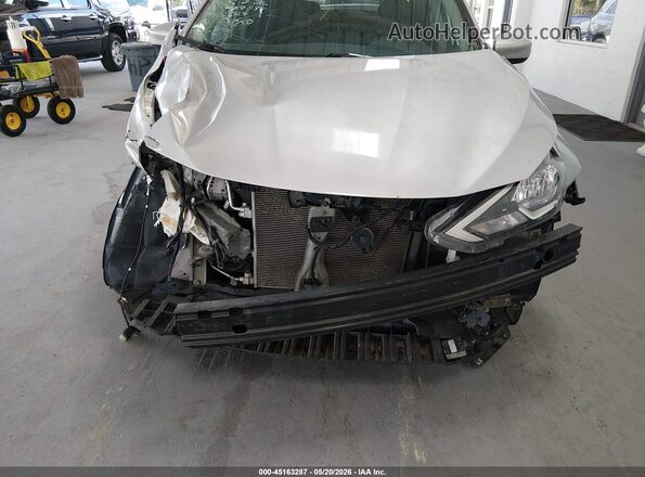 3N1AB7AP6JY212575 2018 NISSAN SENTRA Silver Вид задньої частини салону