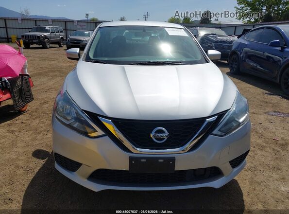 3N1AB7AP7JY220619 2018 NISSAN SENTRA Silver Вид задньої частини салону