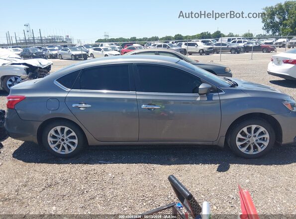3N1AB7AP7JY299046 2018 NISSAN SENTRA Серый Вид щитка приборов