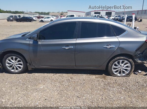 3N1AB7AP7JY299046 2018 NISSAN SENTRA Серый Вид задней части салона