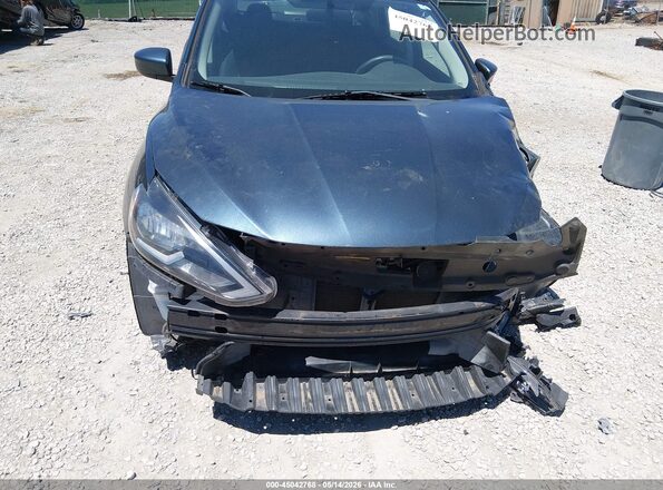 3N1AB7AP9GY308712 2016 NISSAN SENTRA Серый Вид задней части салона