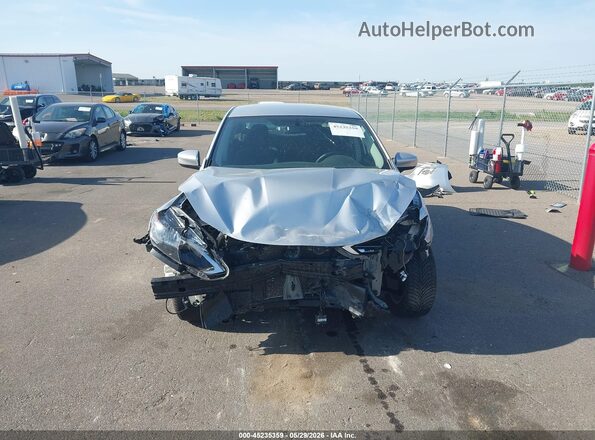 3N1AB7AP9JY345556 2018 NISSAN SENTRA Серебряный Вид щитка приборов