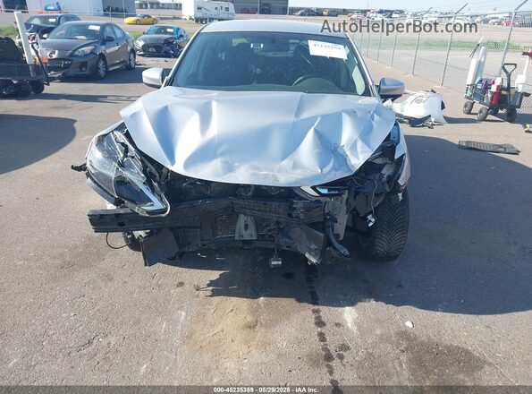 3N1AB7AP9JY345556 2018 NISSAN SENTRA Серебряный Вид спереди