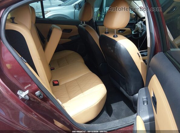 3N1AB8CV2RY379853 2024 NISSAN SENTRA Burgundy Vista de la etiqueta del VIN