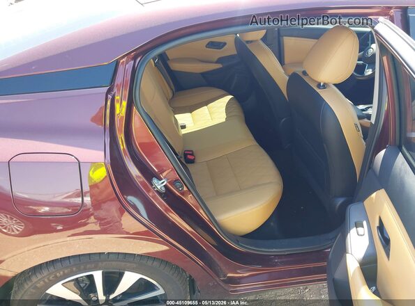 3N1AB8CV5SY221772 2025 NISSAN SENTRA Burgundy Vista de la etiqueta del VIN