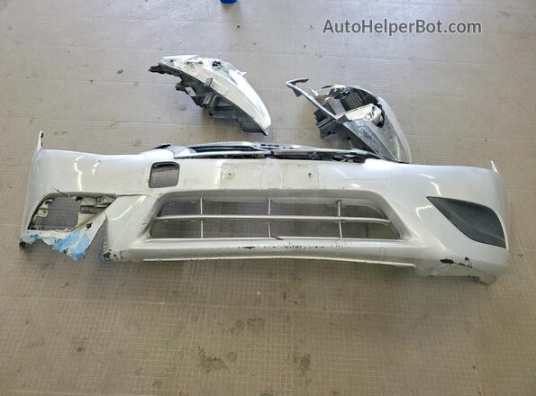 3N1CN7AP0GL841495 2016 NISSAN VERSA Silver Вид підкапотного простору