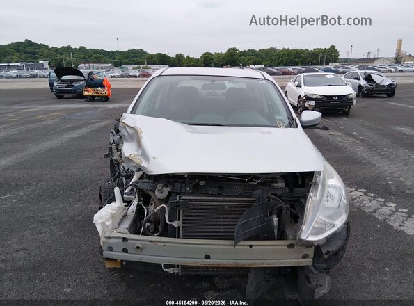 3N1CN7APXGL877372 2016 NISSAN VERSA Серебряный Вид задней части салона