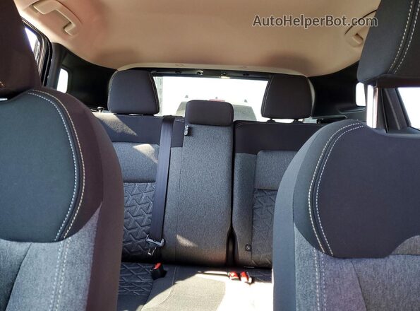 3N8AP6CE7TL318381 2026 NISSAN KICKS Two Tone Vista de los asientos traseros