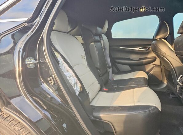 3PCAJ5JR0RF107561 2024 INFINITI QX55 Black Rear interior view