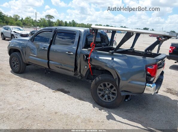 3TMAZ5CN7PM203392 2023 TOYOTA TACOMA Gray Trasero izquierdo