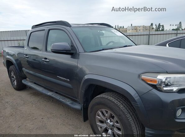 3TMBZ5DN0HM010442 2017 TOYOTA TACOMA Gray Rear interior view