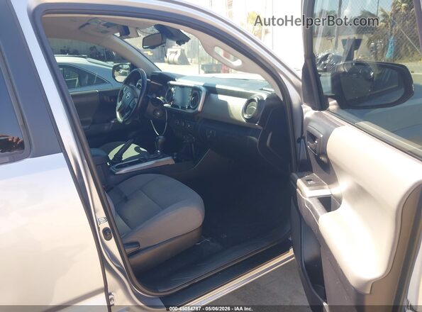 3TMBZ5DN3LM025977 2020 TOYOTA TACOMA Silver წინა სალონის ხედი