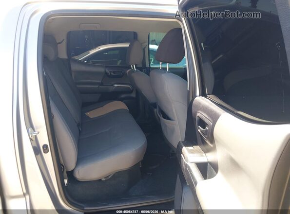 3TMBZ5DN3LM025977 2020 TOYOTA TACOMA Silver VIN კოდის სტიკერის ხედი