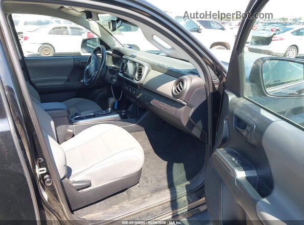 3TMBZ5DN5KM019824 2019 TOYOTA TACOMA Black წინა სალონის ხედი