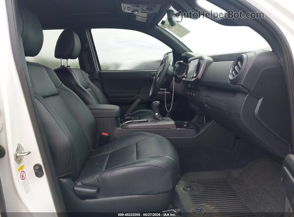 3TMCZ5AN0LM325727 2020 TOYOTA TACOMA White Front interior view