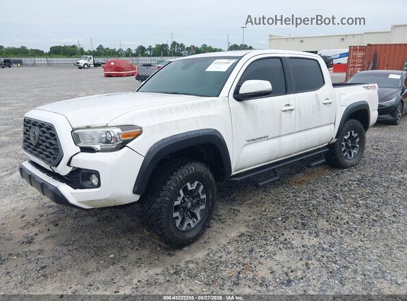 3TMCZ5AN0LM325727 2020 TOYOTA TACOMA White Front left