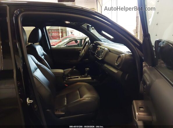 3TMCZ5AN0PM580819 2023 TOYOTA TACOMA Black Widok wnętrza z przodu