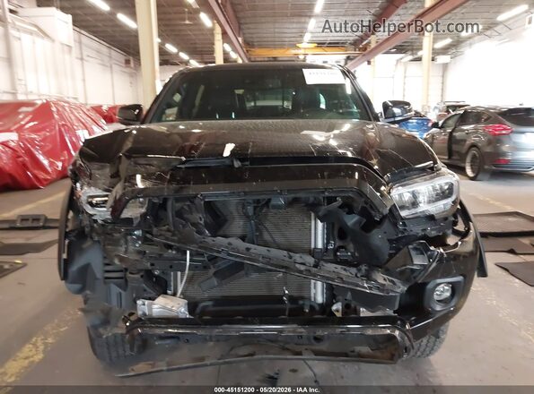 3TMCZ5AN0PM580819 2023 TOYOTA TACOMA Black Widok wnętrza z tyłu