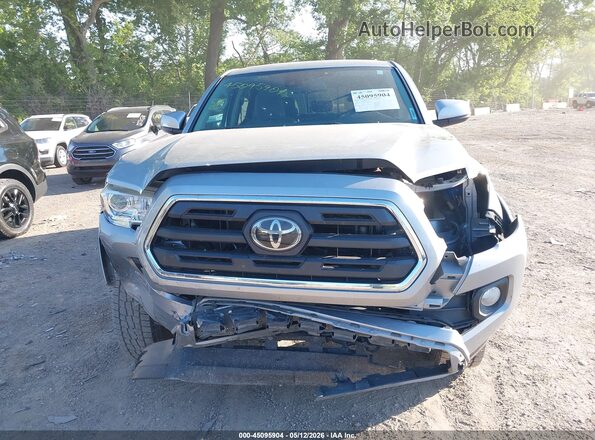 3TMCZ5AN2KM198719 2019 TOYOTA TACOMA Silver Вид задньої частини салону
