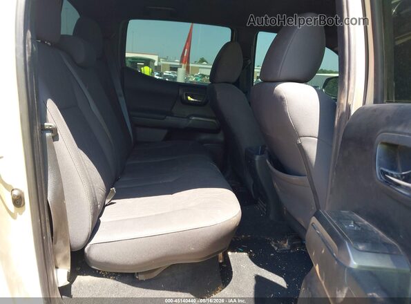 3TMCZ5AN2KM257980 2019 TOYOTA TACOMA Cream Vista de la etiqueta del VIN