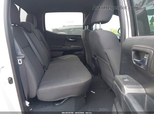 3TMCZ5AN4JM173786 2018 TOYOTA TACOMA White VIN კოდის სტიკერის ხედი