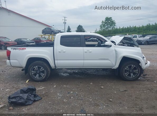 3TMCZ5AN6JM144418 2018 TOYOTA TACOMA White Rear interior view