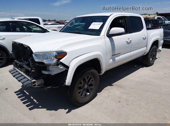 3TMCZ5AN9LM302057 2020 TOYOTA TACOMA Белый 