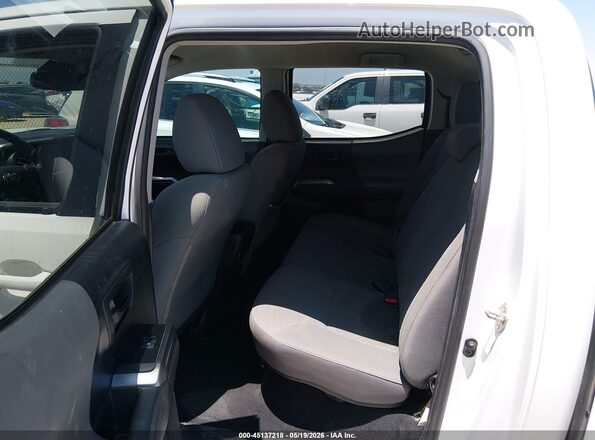 3TMCZ5AN9LM302057 2020 TOYOTA TACOMA Белый 