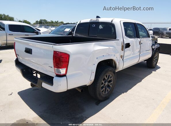 3TMCZ5AN9LM302057 2020 TOYOTA TACOMA Белый 