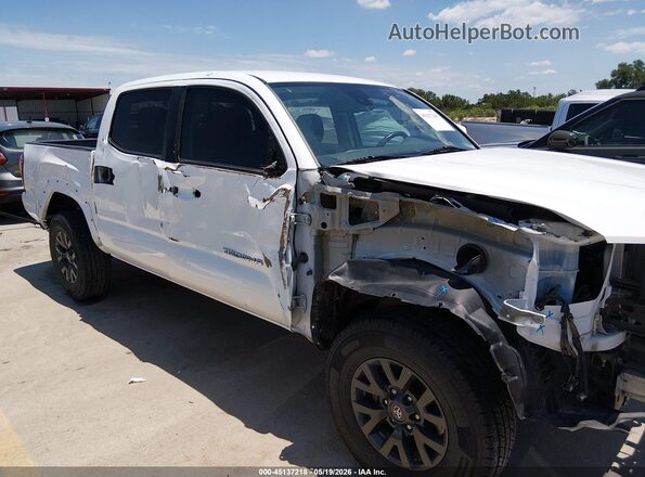 3TMCZ5AN9LM302057 2020 TOYOTA TACOMA Белый 