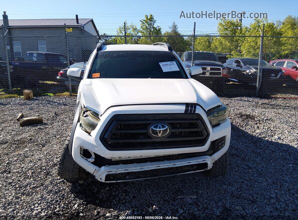 3TMCZ5ANXMM449716 2021 TOYOTA TACOMA White Սալոնի հետևի տեսք