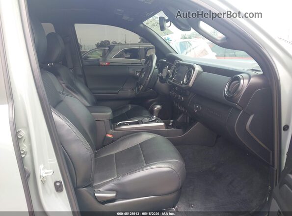 3TMDZ5BN1PM163311 2023 TOYOTA TACOMA Зеленый Вид салона спереди