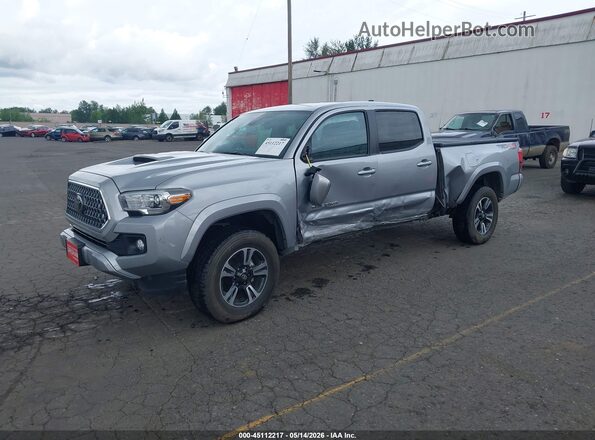 3TMDZ5BN2KM059869 2019 TOYOTA TACOMA Серебряный Передняя левая четверть